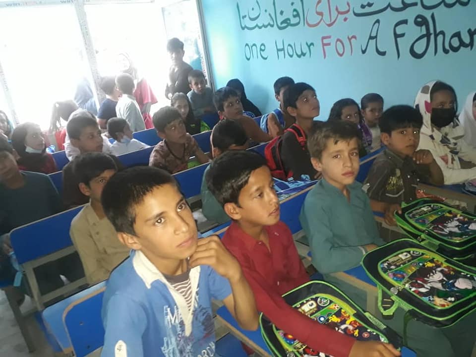 Women learning sewing skills